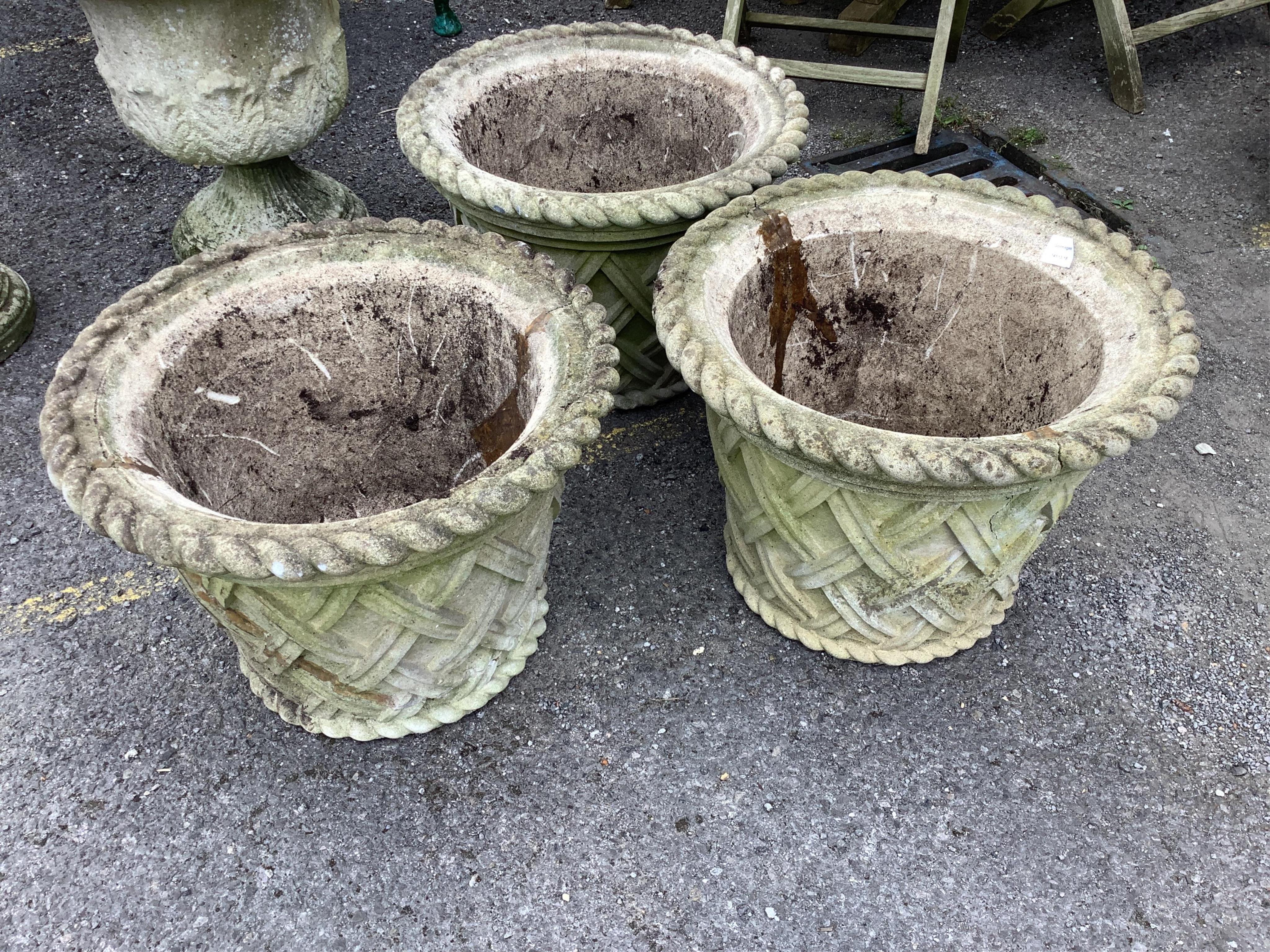 Three medium Haddonstone jardinieres, 53cm diameter, 39cm high. Condition - poor